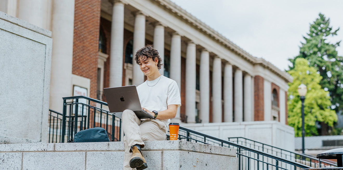 A student studies on OSU's campus.