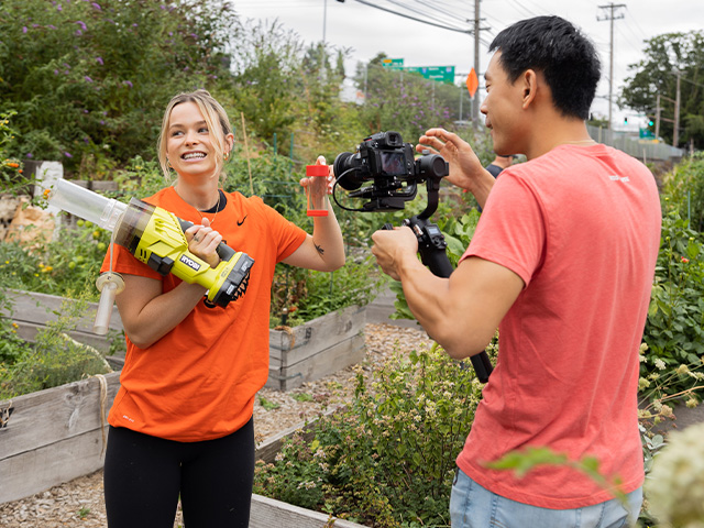 filming-gardener-with-tools.jpg gardener showing filming crew tools